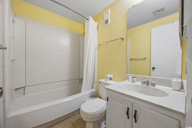 full bathroom featuring tile patterned floors, vanity, toilet, and shower / tub combo