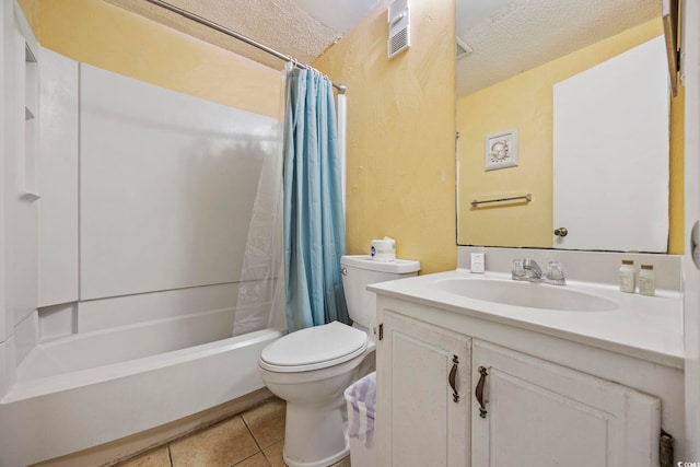 full bathroom with toilet, shower / tub combo with curtain, a textured ceiling, and tile patterned flooring