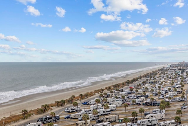 aerial view with a beach view and a water view