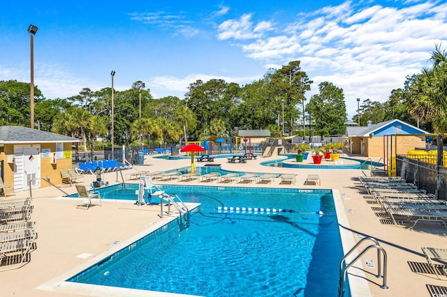 view of pool featuring a patio