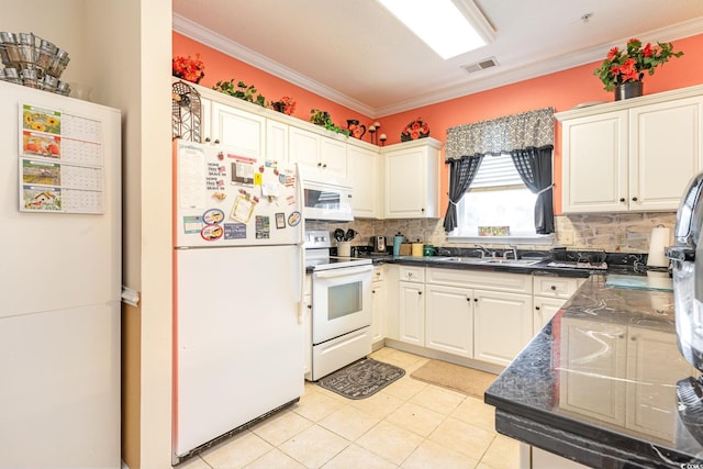 kitchen featuring decorative backsplash, sink, crown molding, white appliances, and light tile patterned floors