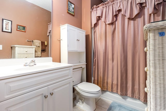 full bathroom with toilet, tile patterned flooring, shower / bath combination with curtain, and vanity