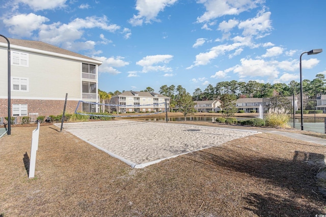 view of home's community with volleyball court