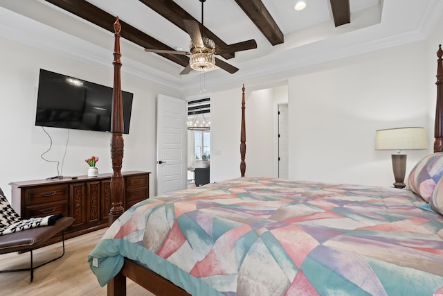 bedroom featuring ceiling fan, beam ceiling, light wood-type flooring, and ornamental molding