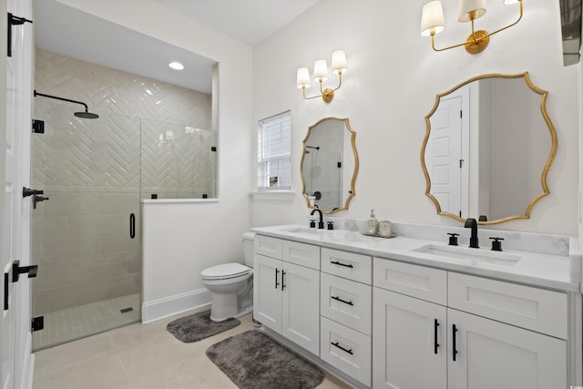 bathroom featuring tile patterned floors, vanity, an enclosed shower, and toilet