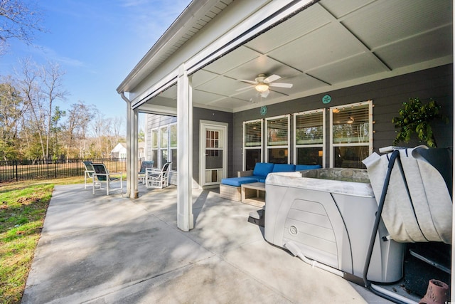 view of patio with outdoor lounge area and ceiling fan