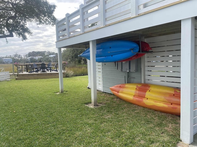 exterior space with a wooden deck and fence