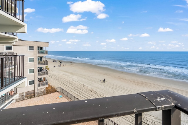 view of water feature with a beach view