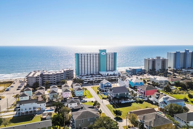 bird's eye view featuring a water view and a city view