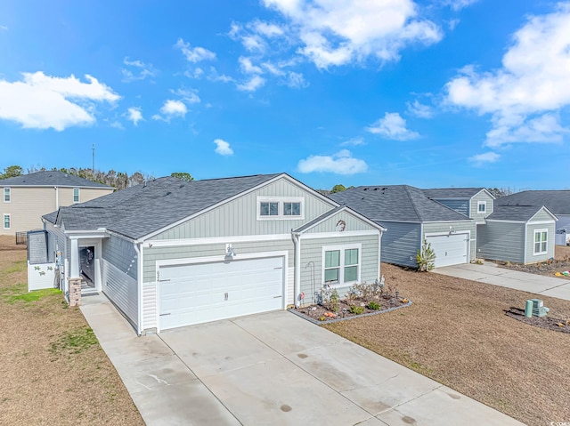 view of front of home with a garage