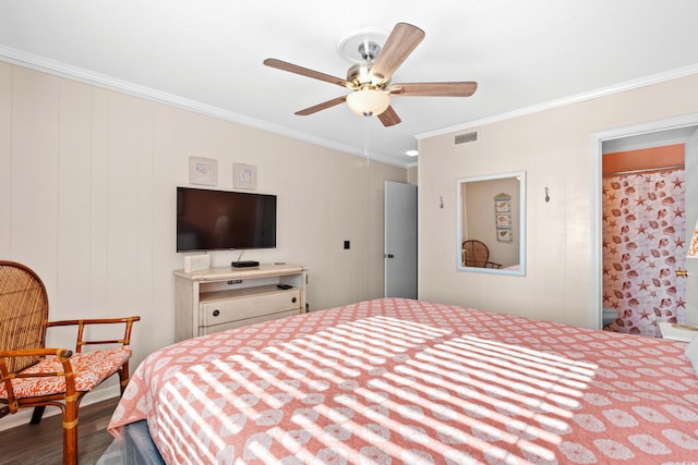 bedroom featuring ceiling fan, dark hardwood / wood-style floors, and ornamental molding