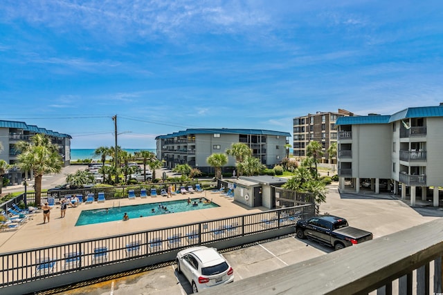 view of swimming pool with a patio area