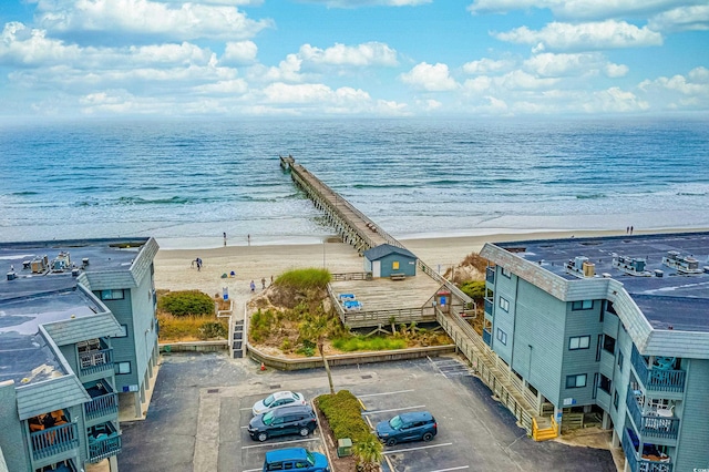 aerial view featuring a water view and a beach view