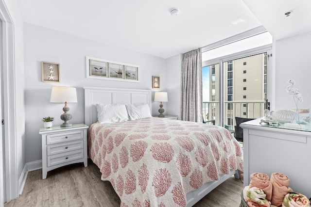 bedroom featuring wood-type flooring