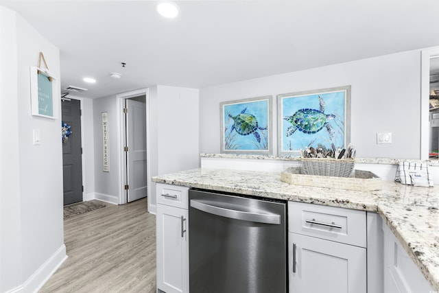 kitchen featuring dishwasher, light wood-type flooring, white cabinets, and light stone counters