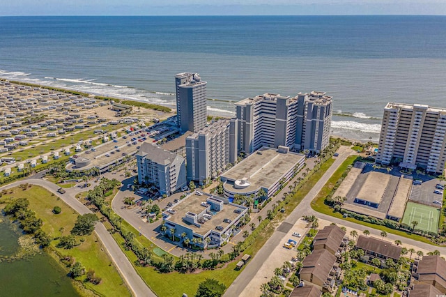 bird's eye view featuring a beach view and a water view