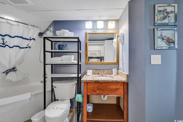 full bathroom featuring shower / tub combo with curtain, vanity, toilet, and tile patterned flooring