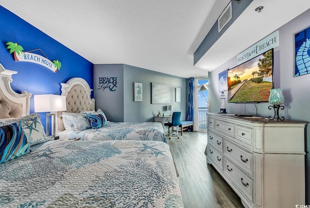 bedroom featuring wood-type flooring