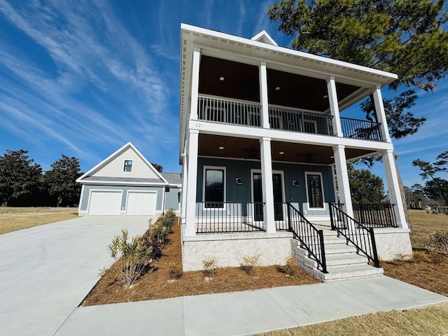 view of front of property with a garage and a porch