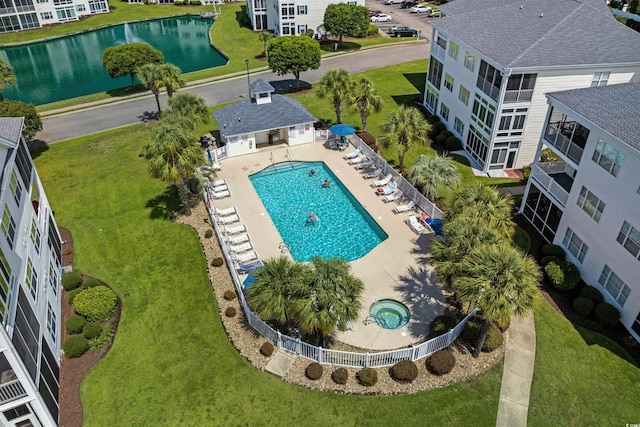 birds eye view of property featuring a water view