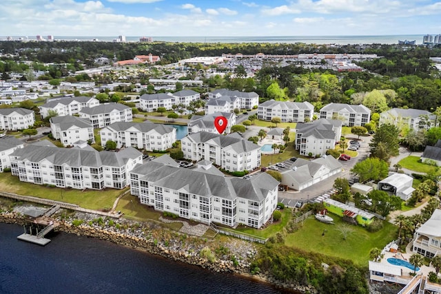 bird's eye view with a water view