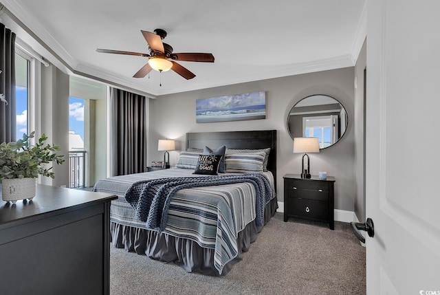 carpeted bedroom with ceiling fan and ornamental molding