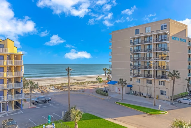 property view of water featuring a beach view