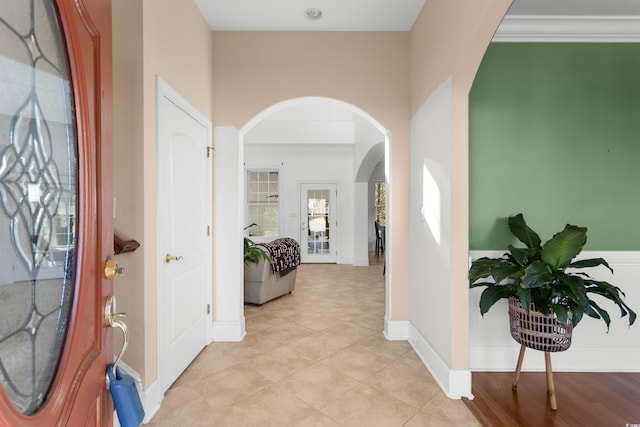 entryway featuring light tile patterned flooring