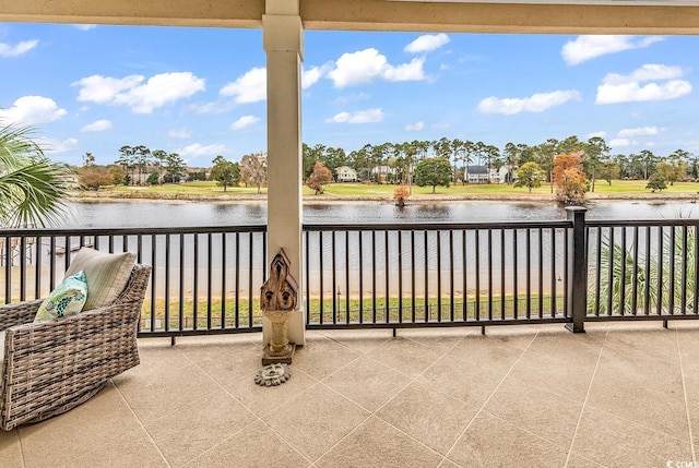 balcony featuring a water view