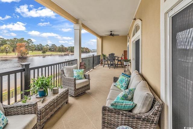 balcony featuring a water view