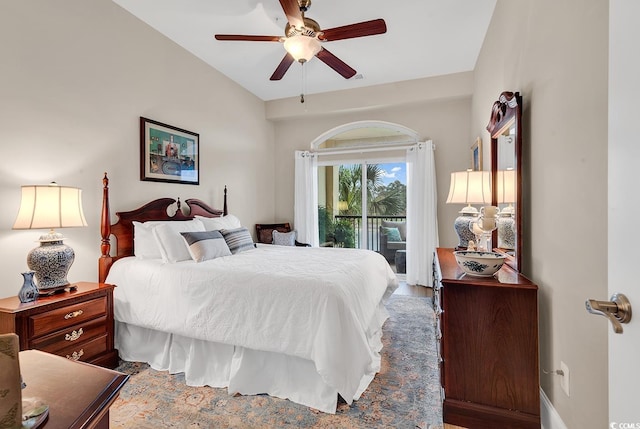 bedroom with hardwood / wood-style floors, access to outside, vaulted ceiling, and ceiling fan