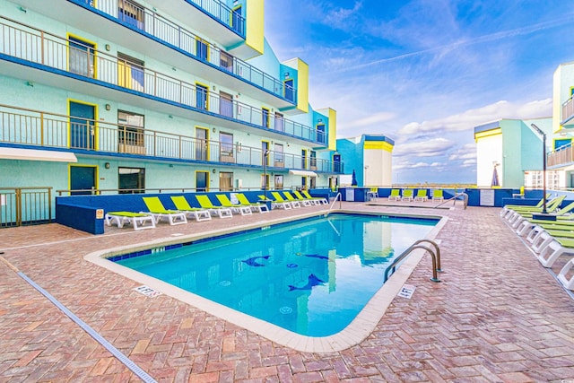 view of pool with a patio area