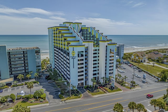 aerial view featuring a water view and a view of the beach