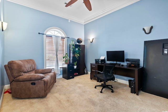 office area with ceiling fan, ornamental molding, and light carpet