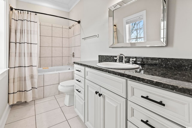 full bathroom featuring vanity, tile patterned floors, shower / bath combination with curtain, crown molding, and toilet