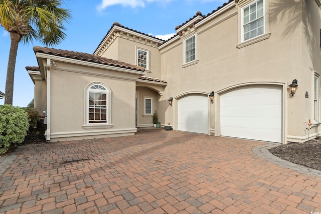 view of front of property featuring a garage