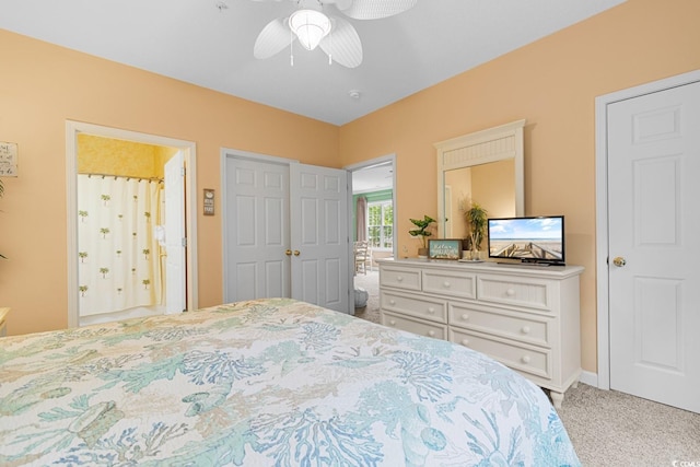 carpeted bedroom with ceiling fan