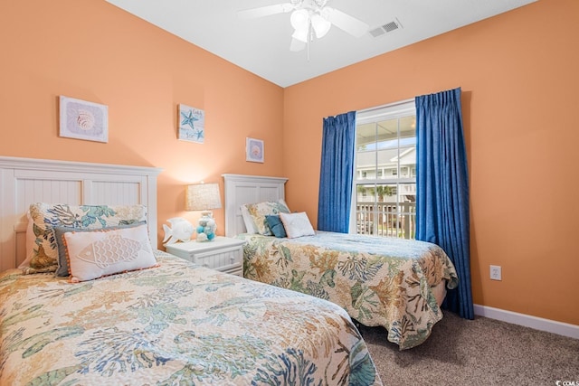 carpeted bedroom featuring ceiling fan