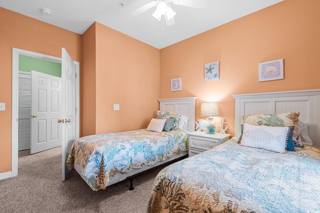 bedroom with ceiling fan and light carpet