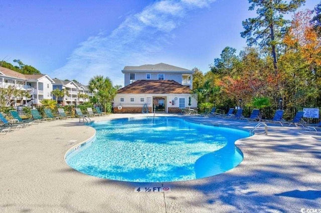 view of pool with a patio area