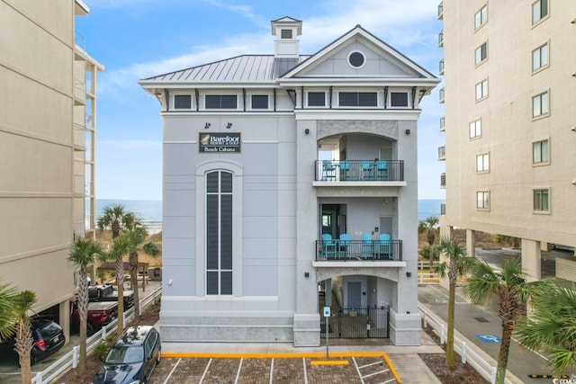 view of building exterior featuring a water view