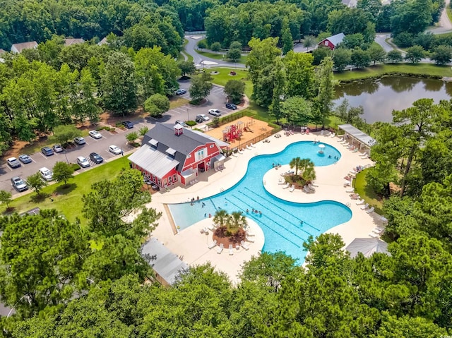 birds eye view of property featuring a water view