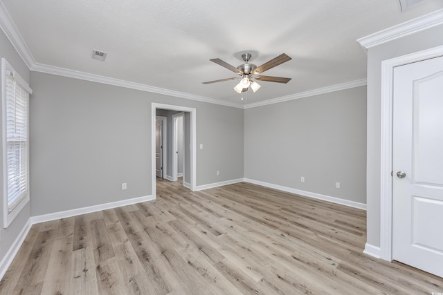 unfurnished bedroom featuring ceiling fan, ornamental molding, and light hardwood / wood-style flooring