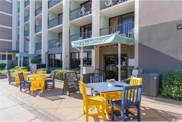 view of patio / terrace featuring central AC unit