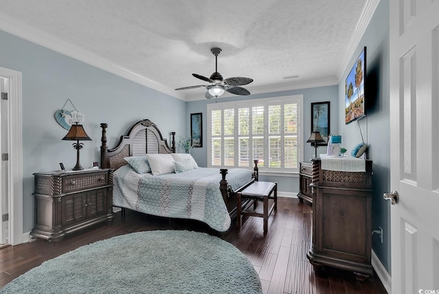 bedroom featuring a textured ceiling, ceiling fan, crown molding, and dark wood-type flooring