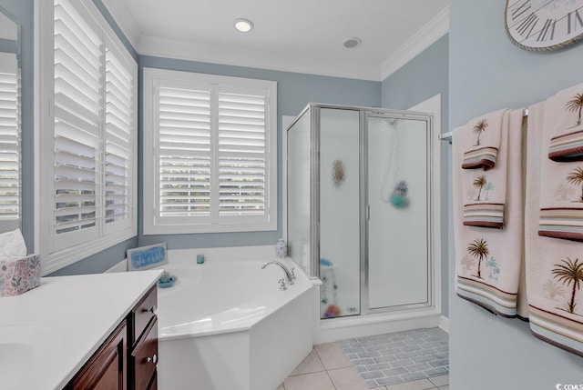 bathroom featuring tile patterned flooring, vanity, independent shower and bath, and plenty of natural light