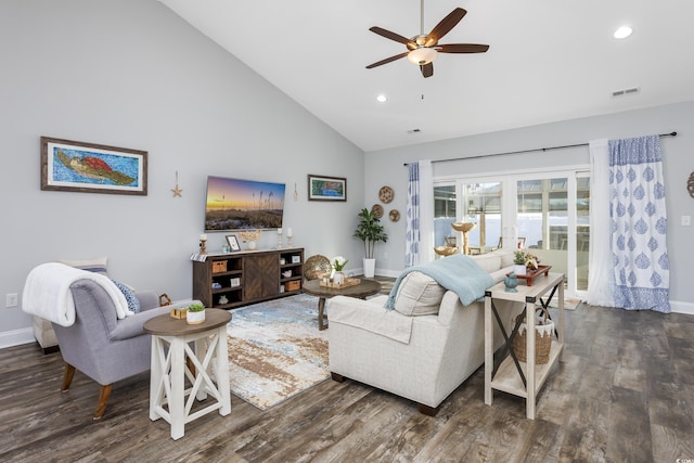 living room featuring dark hardwood / wood-style floors, high vaulted ceiling, and ceiling fan