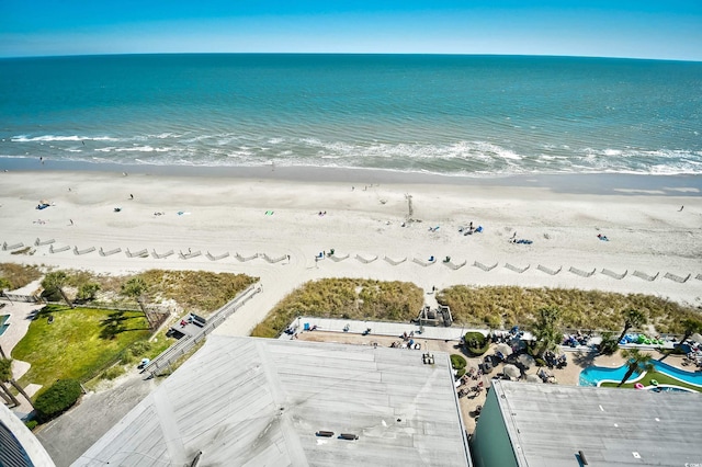 bird's eye view with a view of the beach and a water view