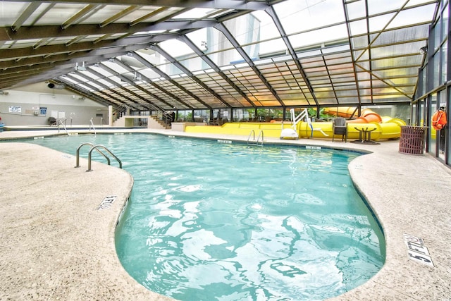 view of pool featuring a patio and a lanai