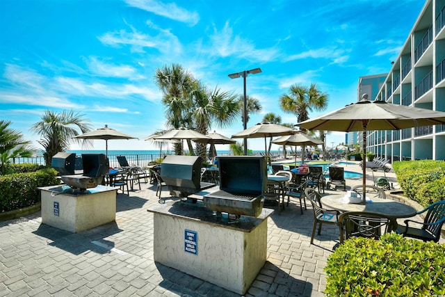 view of patio / terrace featuring a community pool